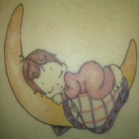 Child sleeping on moon tattoo
