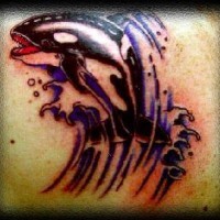Killer whale tattoo with waves