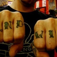 Knuckle tattoo,sandwich, green styled inscription