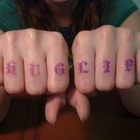 Knuckle tattoo, tauf liff, violet styled inscription