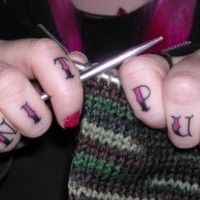 Knuckle tattoo, knit purl, red designed words