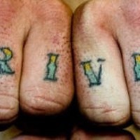 Knuckle tattoo, driven, decorated with star, flower