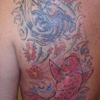Koi fishes tattoo on back