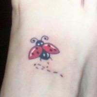 Ladybug flight tattoo