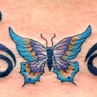 Colourful tribal butterfly tattoo