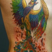 Phoenix rising from ashes tattoo