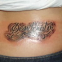 Latin writings lower back  tattoo