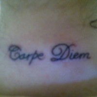 Carpe diem tattoo in latin