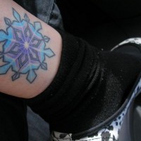 Leg tattoo, designed, blue, volumetric snowflake