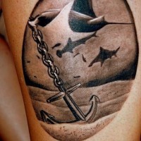 Leg tattoo, flying fish with anchor, dolphins