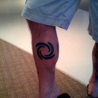 Leg tattoo, parted circle like a wheel