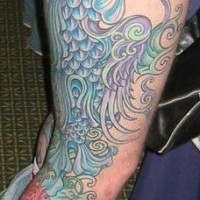 Leg tattoo, tall blue monster-fish