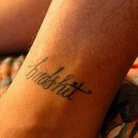 Leg tattoo, badshit, refined, thin inscription