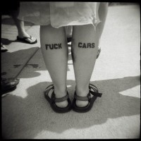 Leg tattoo, fuck cars, black styled inscription