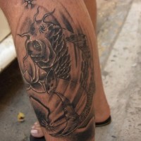 Leg tattoo, strange fish with one eye