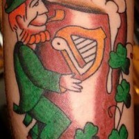 Leprechaun with huge beer bock coloured tattoo