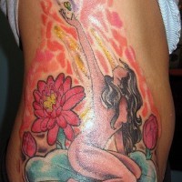Naked girl on blue water lily tattoo