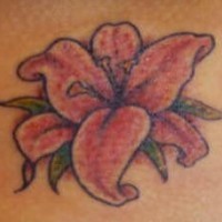 Small pink lily tattoo