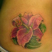 Lush pink lily tattoo
