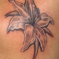 Black lily flower tattoo