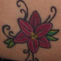 Minimalistic red lily tattoo