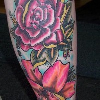 Lily and rose flowers tattoo