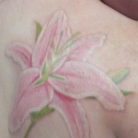 Tender pink lily tattoo