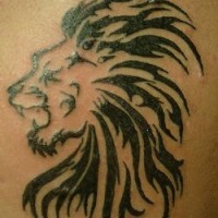 Lion with tribal mane tattoo