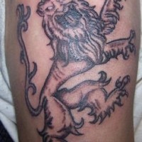Roaring heraldic lion tattoo