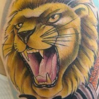 Roaring lion colourful tattoo