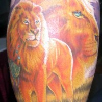 Colourful lion and son tattoo