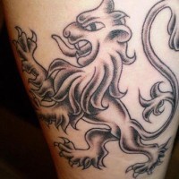 Volumetric heraldic lion tattoo