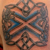 Heraldic lions on crest tattoo