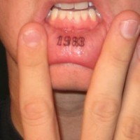 Lip tattoo, 1983, black date, named year