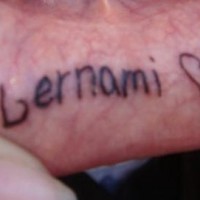 Lip tattoo, lernami love, black inscription