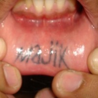Lip tattoo, majik, black simple word