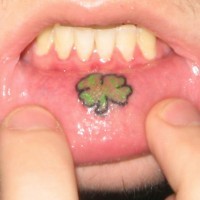 Lip tattoo, little, green leaf, clover