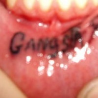 Lip tattoo, gangsta, black, styled inscription