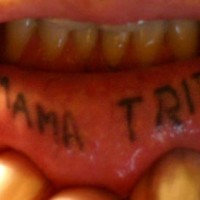 Lip tattoo, mama tried, simple styled inscription