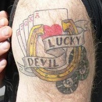 Lucky devil horseshoe tattoo