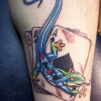 Lizard on cards  tattoo in colour