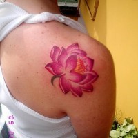 Pink lotus tattoo on shoulder