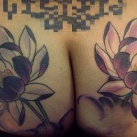 Lotus flowers tattoo on butt cheeks