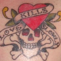 Love kills slowly with heart and skull tattoo