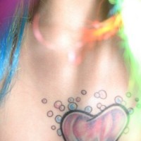 Colourful heart with bubbles tattoo
