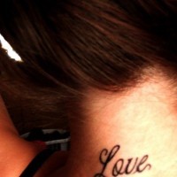 Small love tattoo on neck