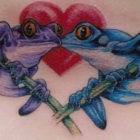 Blue and purple frogs kissing tattoo