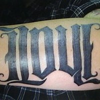 Love black ink lettering tattoo