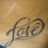 Love word in heart shape tattoo