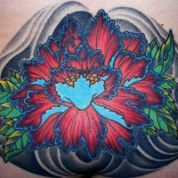 Lower back tattoo, very bright, charming, red and blue flower